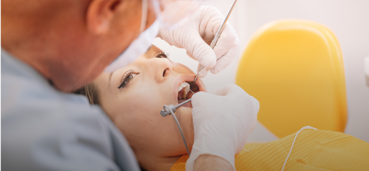 dentist cleaning teeth